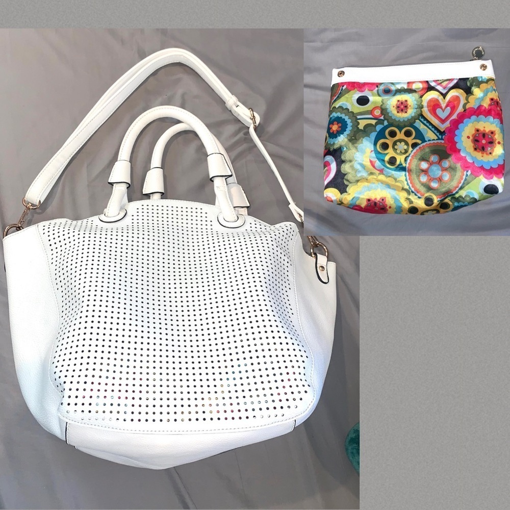 white perforated faux leather tote bag purse with floral snap in bag
